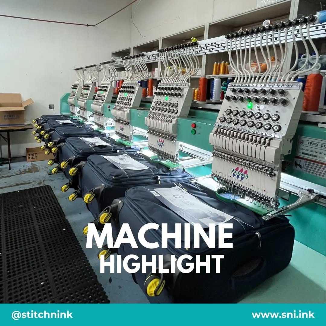 Embroidery machine working detailed patterns on bags
